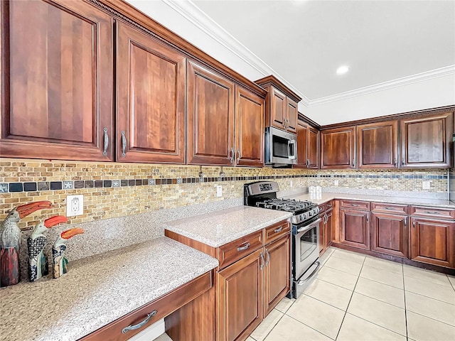 kitchen featuring backsplash, light stone countertops, ornamental molding, appliances with stainless steel finishes, and light tile patterned flooring