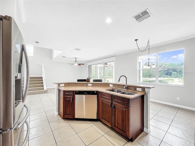 kitchen featuring stainless steel appliances, ceiling fan, crown molding, sink, and light tile patterned flooring