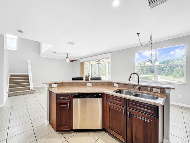 kitchen with stainless steel dishwasher, ceiling fan with notable chandelier, sink, light tile patterned floors, and decorative light fixtures