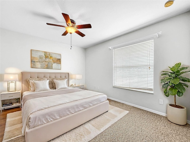 bedroom featuring carpet and ceiling fan