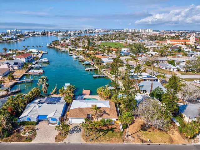 birds eye view of property featuring a water view