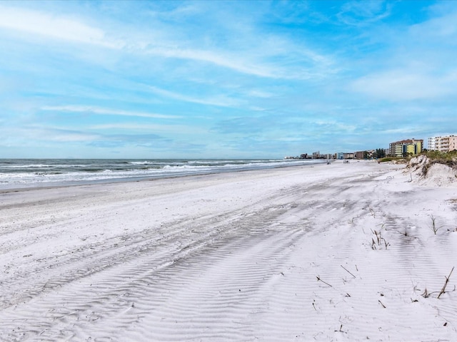 property view of water with a beach view