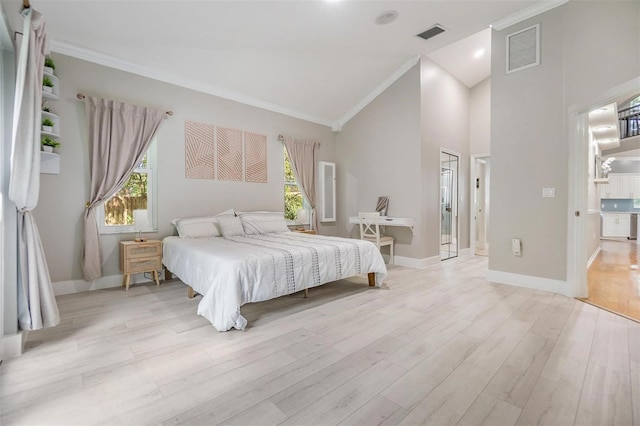 bedroom with light wood-type flooring, high vaulted ceiling, and crown molding