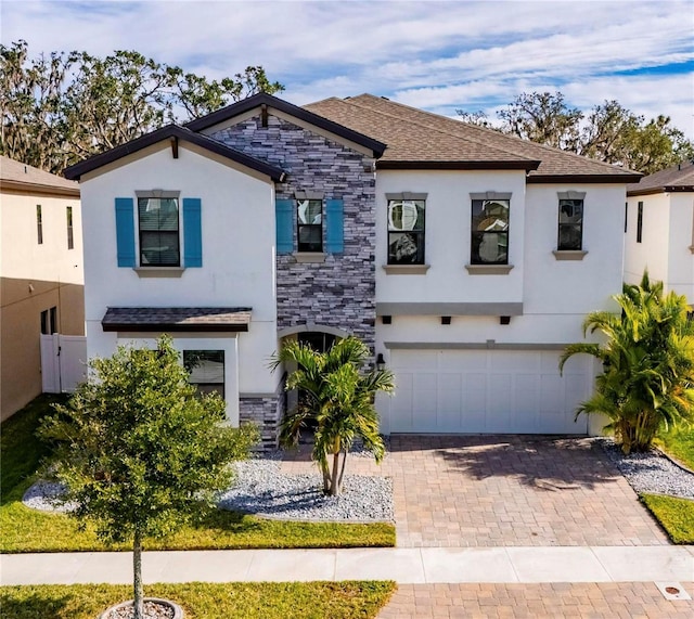 view of front of property featuring a garage