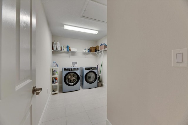 laundry room featuring washing machine and clothes dryer