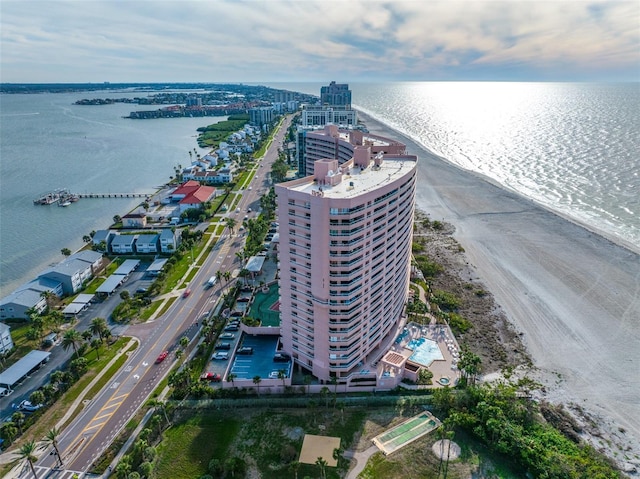 drone / aerial view with a view of the beach and a water view