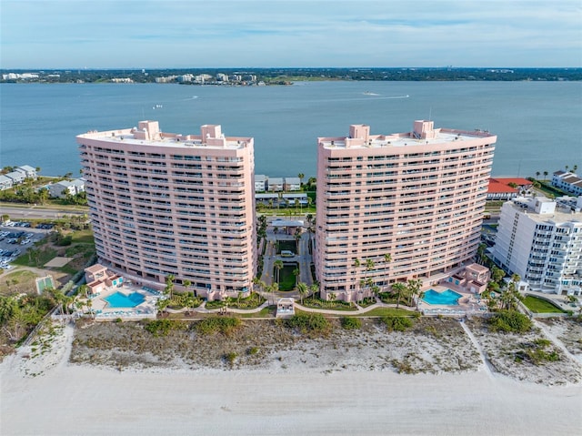 birds eye view of property featuring a water view