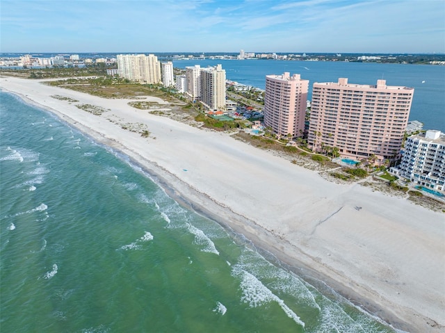 aerial view with a view of the beach and a water view