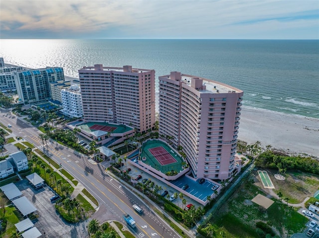 aerial view featuring a water view and a view of the beach