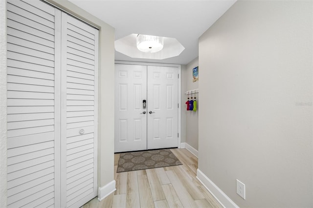 doorway to outside with light wood-type flooring