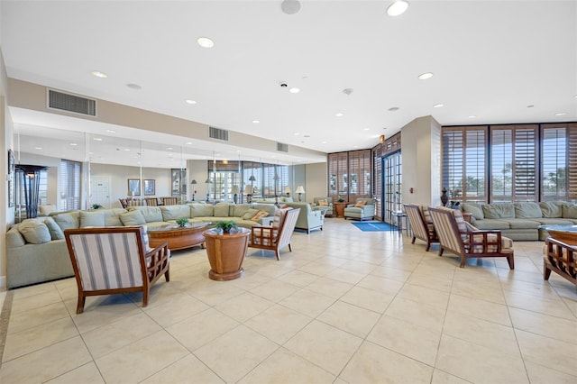 tiled living room with expansive windows