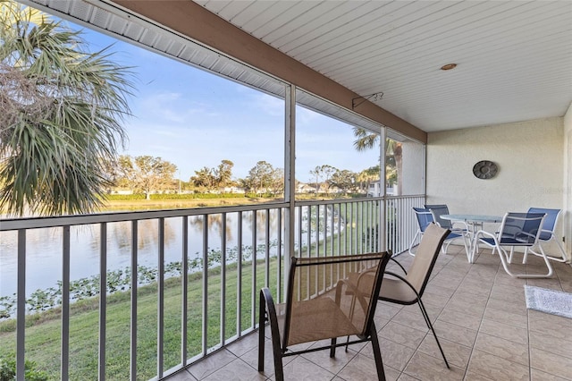 balcony featuring a water view