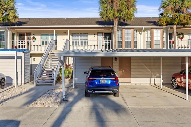 multi unit property featuring a balcony