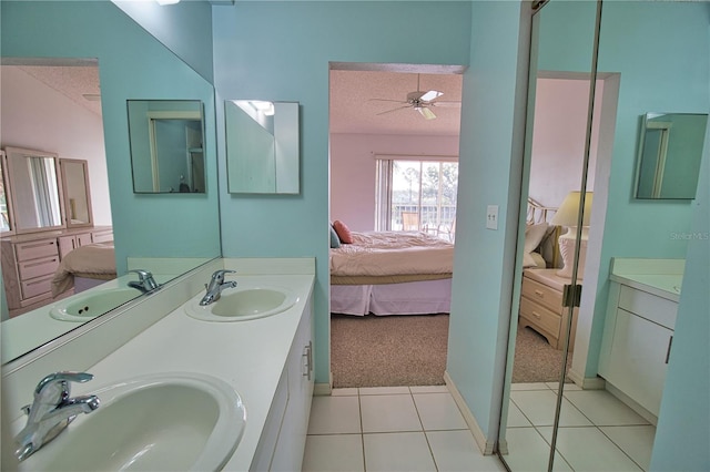 201 Silver Lake Dr Unit 204, Venice, FL 34292 - bathroom with a sink, tile patterned flooring, and ensuite bathroom