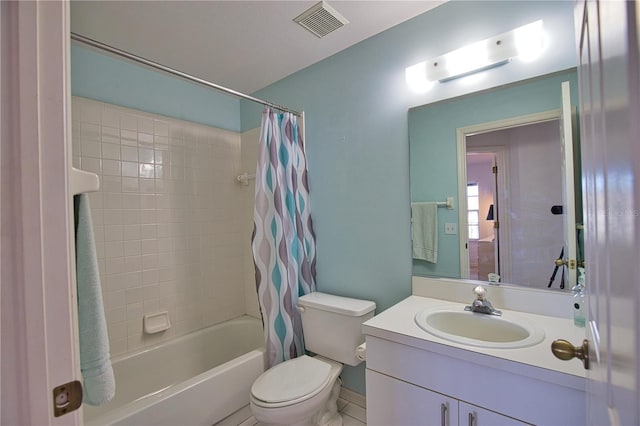 201 Silver Lake Dr Unit 204, Venice, FL 34292 - full bathroom with vanity, toilet, baseboards, shower / tub combo, and visible vents