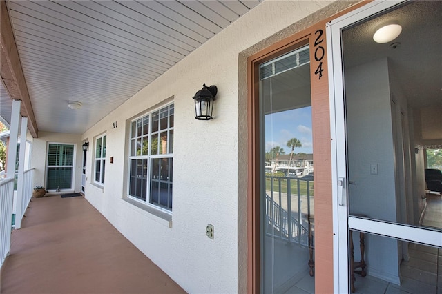 201 Silver Lake Dr Unit 204, Venice, FL 34292 - exterior space with stucco siding