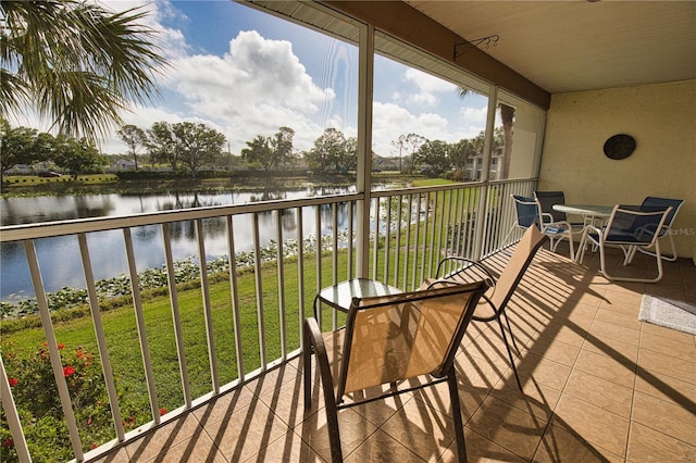 201 Silver Lake Dr Unit 204, Venice, FL 34292 - balcony featuring a water view
