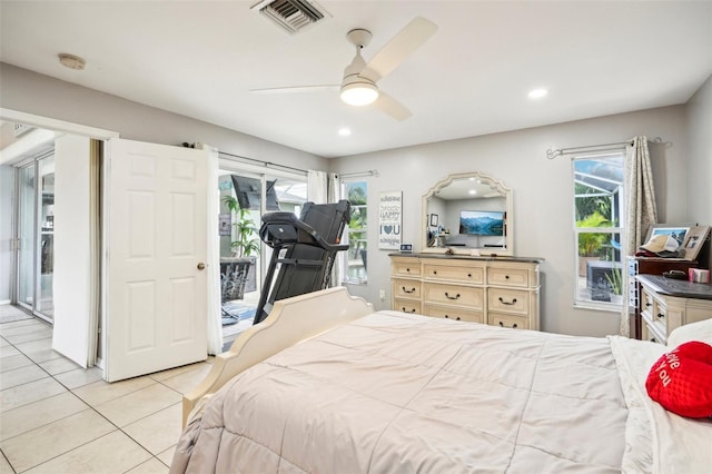 bedroom featuring access to exterior, ceiling fan, and light tile patterned floors