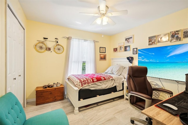 bedroom with a closet and ceiling fan