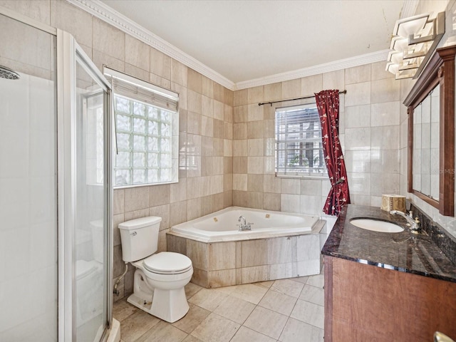 full bathroom featuring vanity, crown molding, tile walls, tile patterned flooring, and toilet