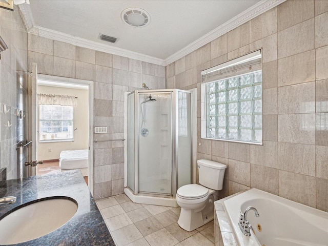 full bathroom featuring a healthy amount of sunlight, tile walls, and crown molding