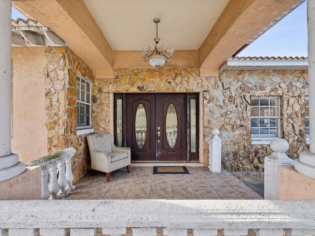 doorway to property with french doors