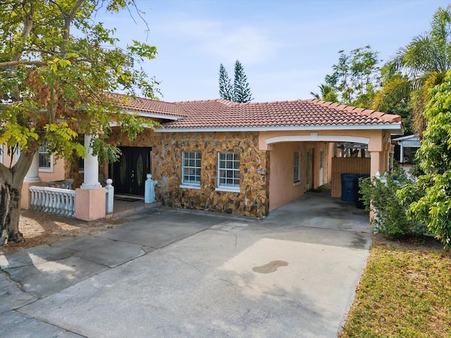 view of front facade with a carport