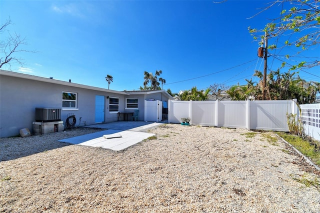 back of property with a patio area