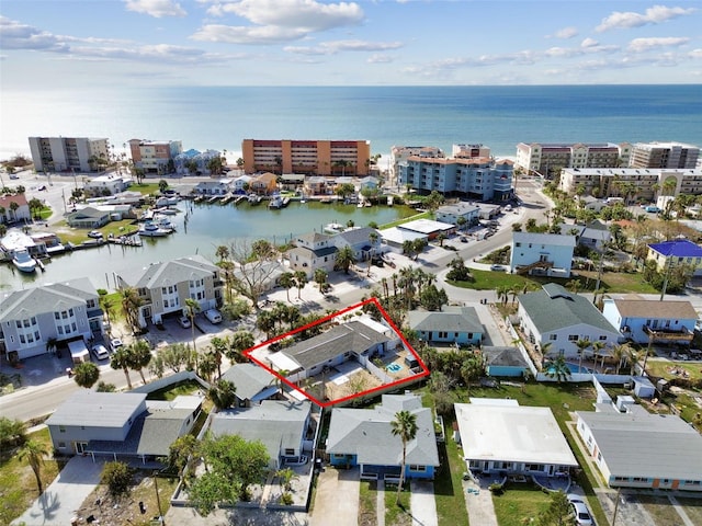 birds eye view of property featuring a water view