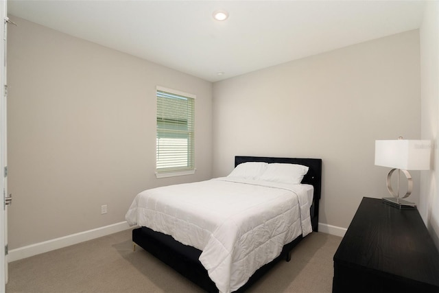 bedroom with carpet floors, recessed lighting, and baseboards