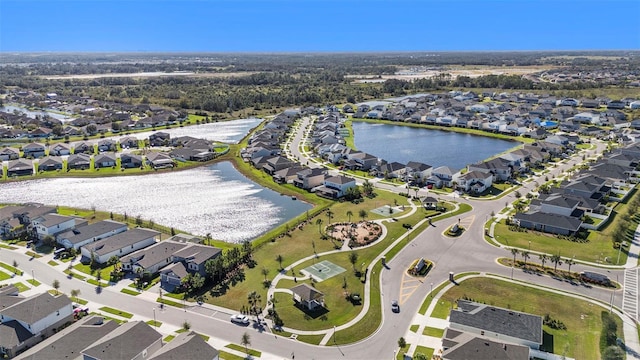 aerial view featuring a water view and a residential view