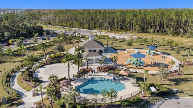 aerial view featuring a wooded view