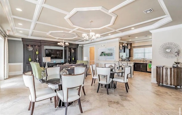 dining room featuring a chandelier, ornamental molding, coffered ceiling, and visible vents