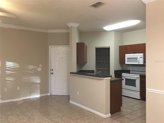 kitchen featuring kitchen peninsula, light tile patterned floors, white appliances, and ornamental molding