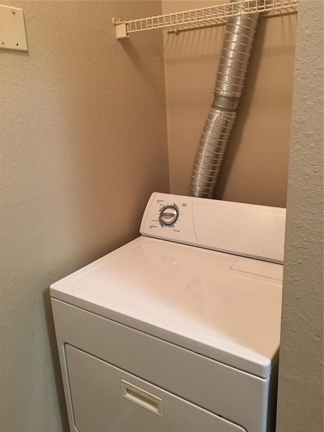 laundry room with washer / dryer