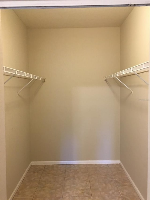 walk in closet featuring tile patterned floors