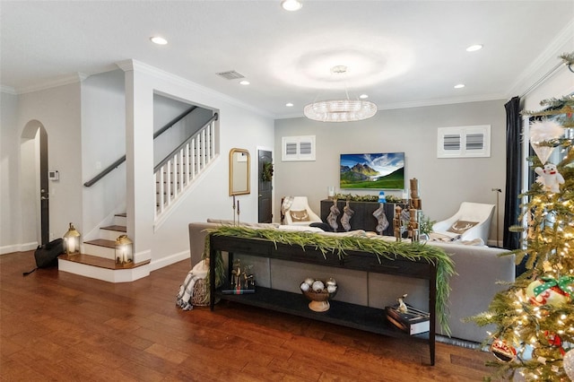 living room with crown molding and dark hardwood / wood-style flooring