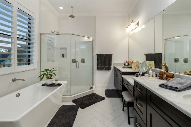 bathroom with tile patterned floors, ornamental molding, separate shower and tub, and vanity