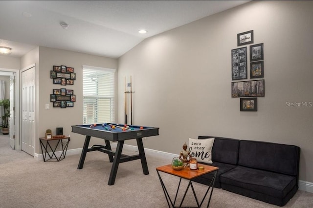 game room featuring light carpet and lofted ceiling