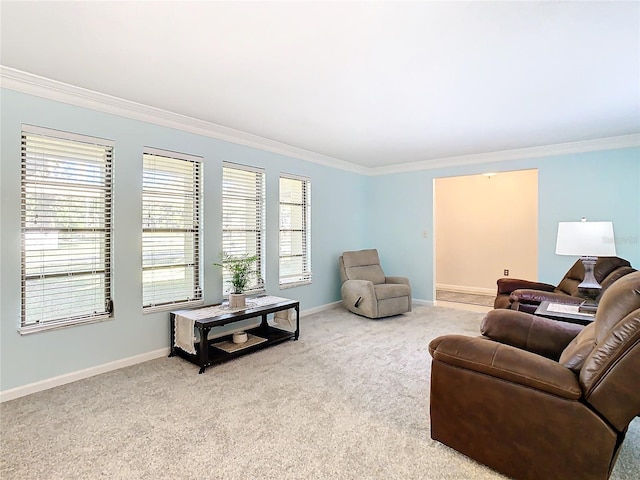 carpeted living room featuring ornamental molding