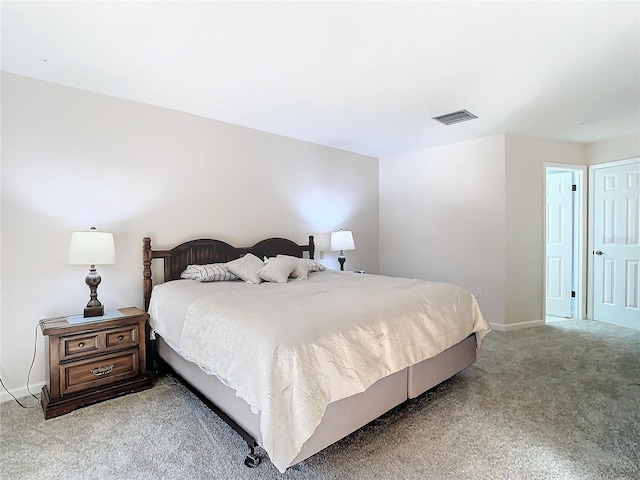 bedroom featuring light carpet