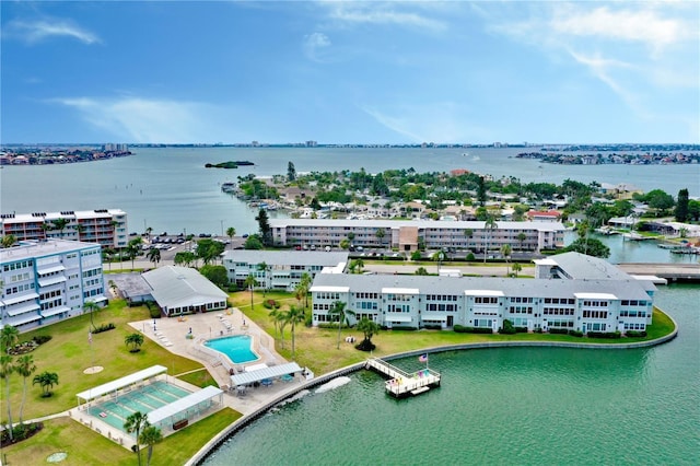 birds eye view of property featuring a water view