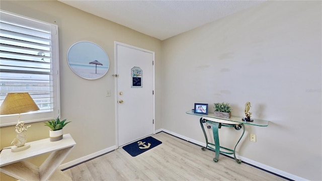 entryway with light wood-type flooring