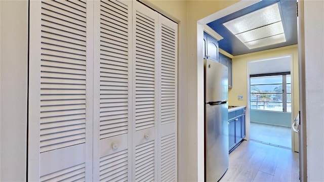 corridor featuring light hardwood / wood-style flooring