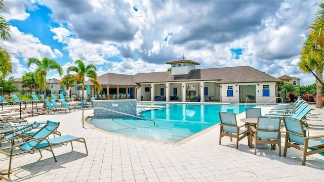 view of pool featuring a patio area