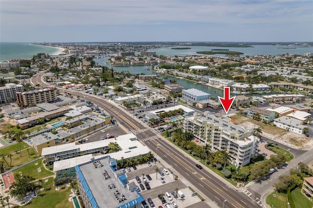 drone / aerial view with a view of city and a water view