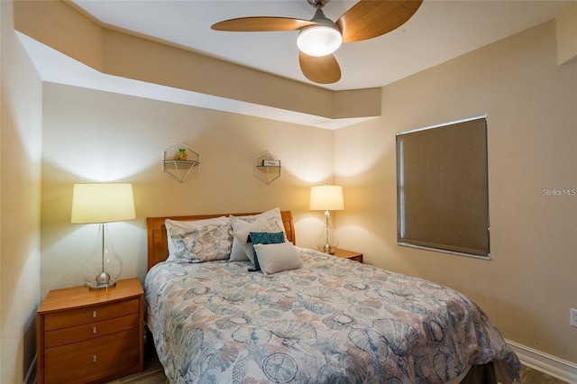 11605 Gulf Blvd Unit 307, Saint Petersburg, FL 33706 - bedroom with wood finished floors and a ceiling fan