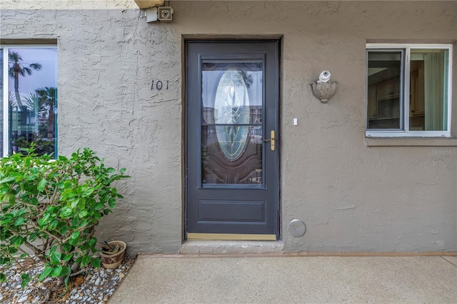 3500 Lake Bayshore Dr Unit K-101, Bradenton, FL 34205 - entrance to property with stucco siding