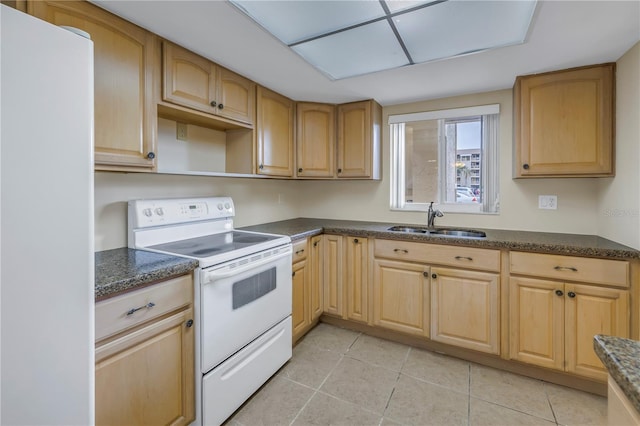 kitchen featuring white appliances, light tile patterned floors, a sink, and open shelves