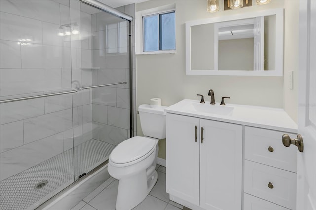 full bathroom featuring a stall shower, vanity, and toilet